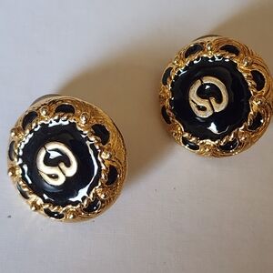 Exclusive St. John Elegant Hand Enameled Black and Gold Clip On Earrings.